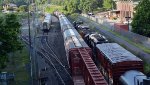 NS train K95 heads south on track 1 with parked Regional #171(14) on its left and the head end of NS train 13R on its right